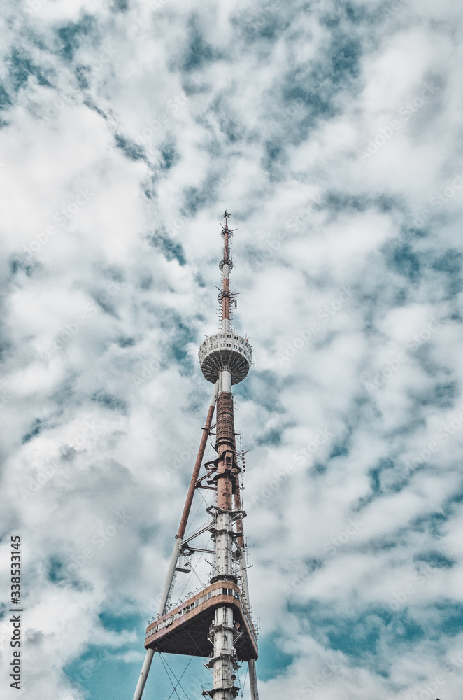 TV tower in Tbilisi Georgia against a cloudy sky TV tower in Tbilisi Georgia against a cloudy sky