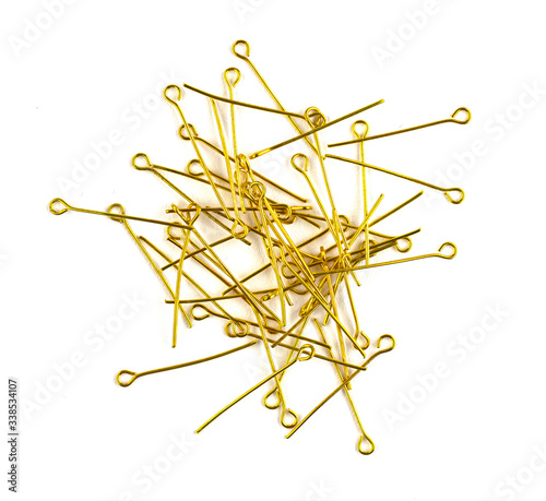 beautiful gold hairpins, stars, various hair decorations isolated on a white background. accessories for handmade jewelry