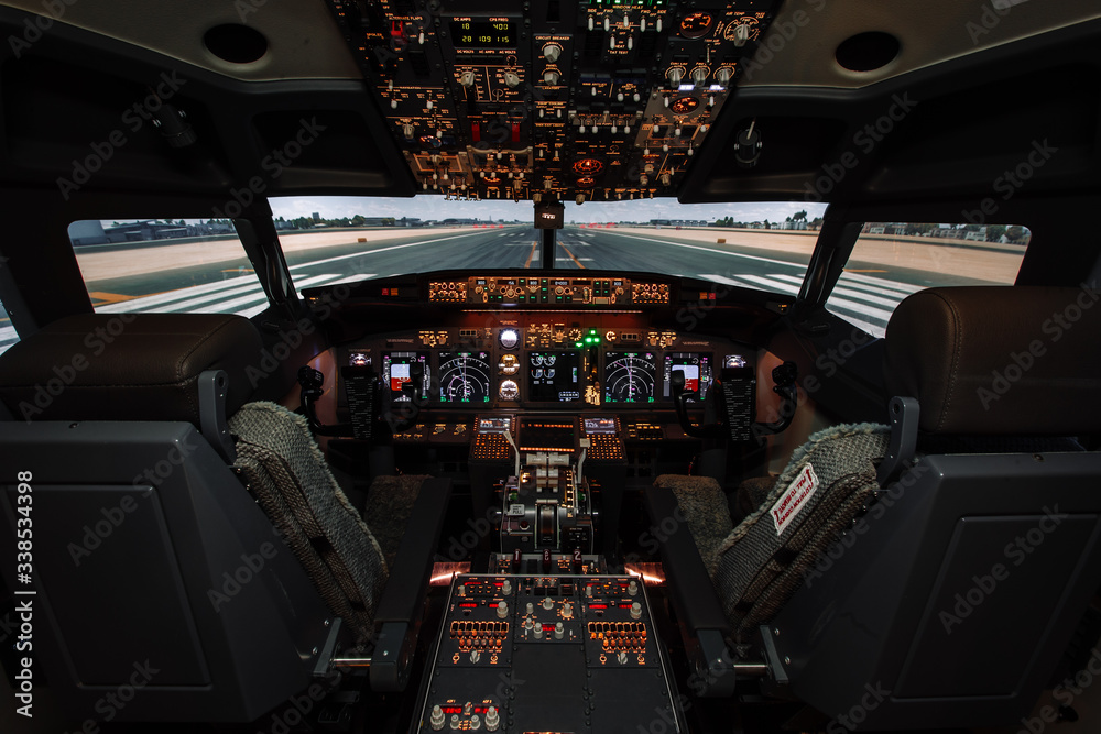 Cockpit of modern Boeing aircraft. No pilots in cabin. Flights suspended because of coronavirus.  Content for newspapers