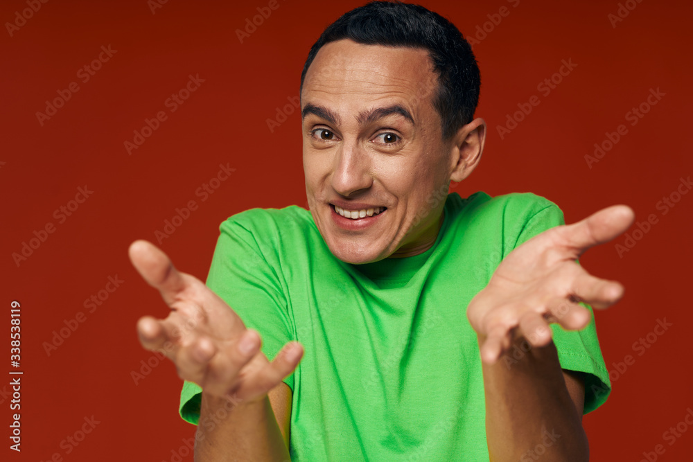 Fototapeta premium man gesture with hands and teeth grin