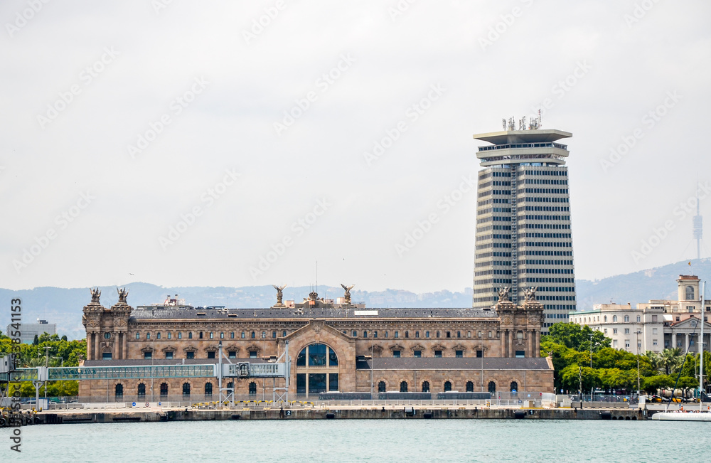 View from the sea to Aduana de Barcelona, old customs building built in neoclassical style at Port Vell 
