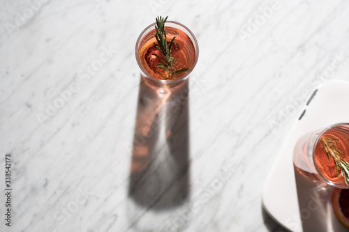 Summer time cocktail with rosemary 