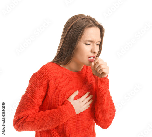 Ill coughing young woman on...