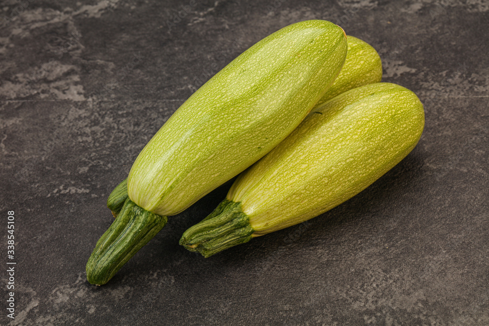 Young tasty zucchini over board Young tasty zucchini over board