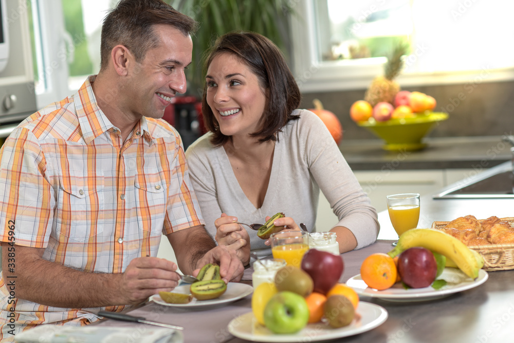 Middle age couple enjoys their healthy breakfast