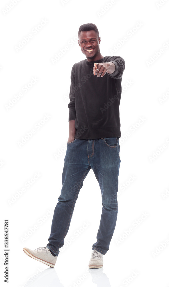 Fototapeta premium cheerful stylish guy pointing at you. isolated on white