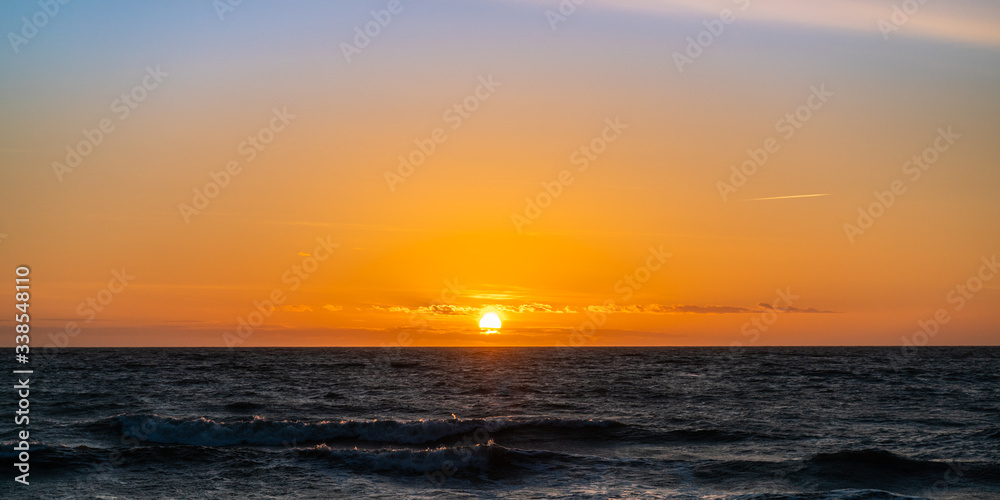 Panoramic view of a beautiful sunset over the sea.