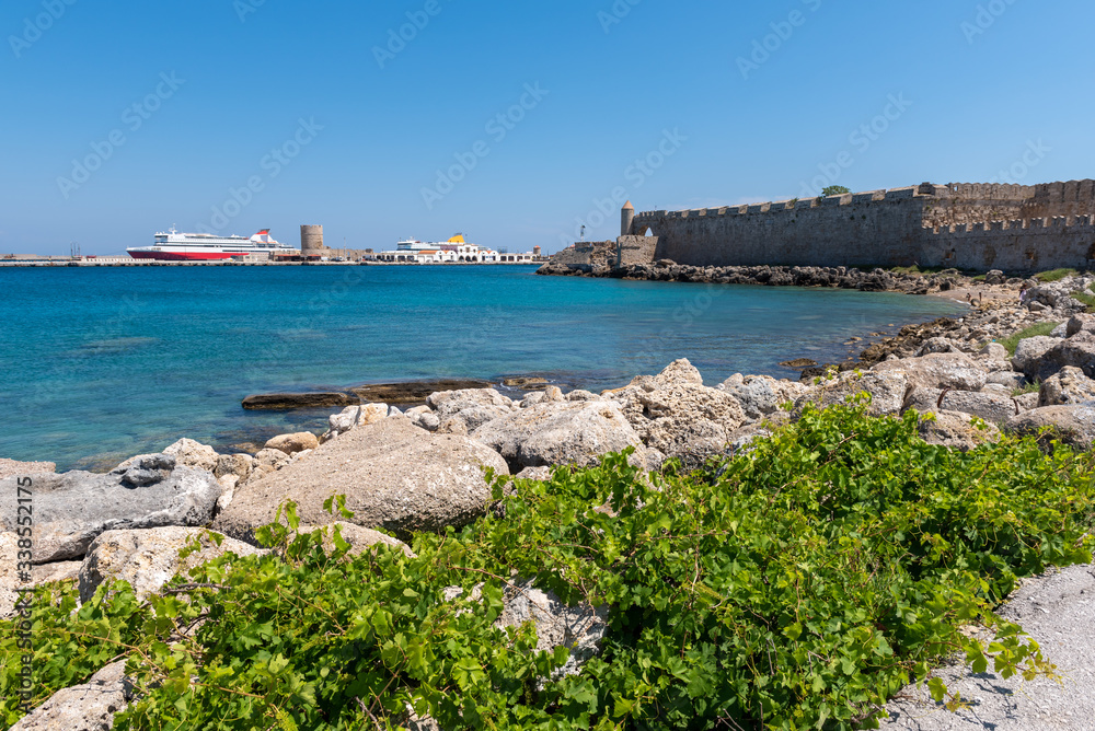 The coast of Rhodes and the port of Mandrakia. Greece