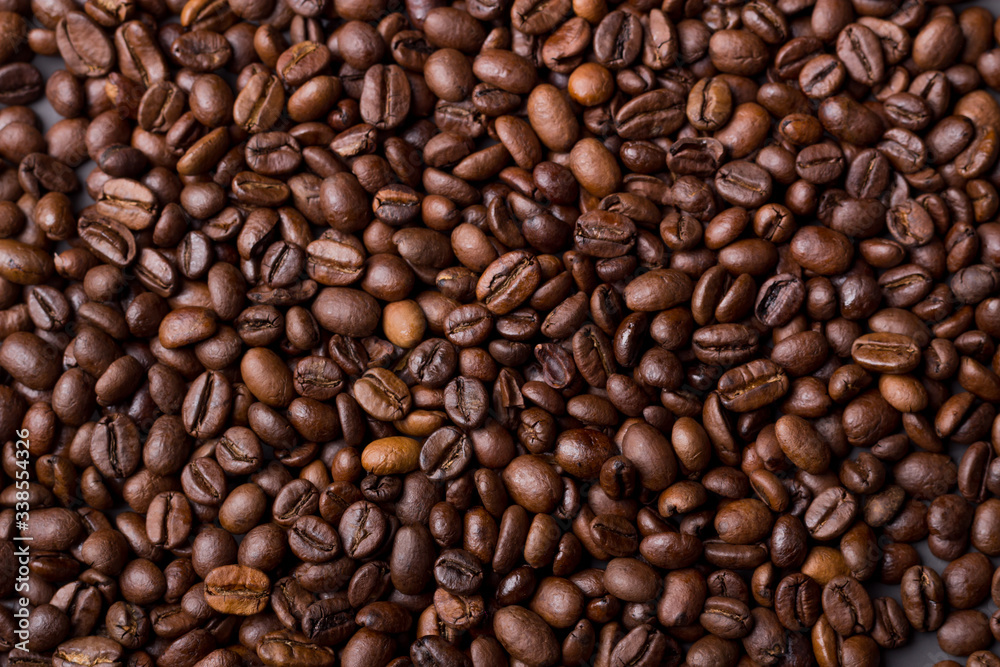 Fototapeta premium Tekstura ziaren kawy na szarym tle