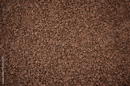 brown earth surface, top view. organic soil texture