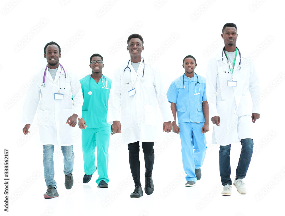 group of different doctors rush to the rescue. isolated on white group of different doctors rush to the rescue. isolated on white