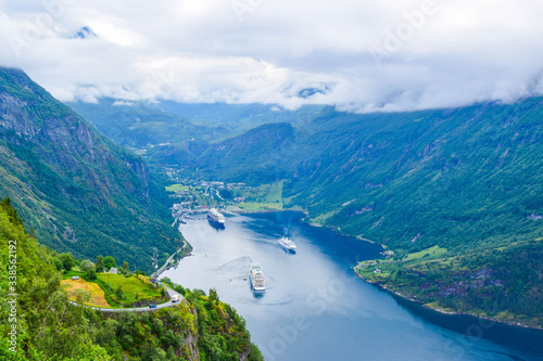 The cruise liners at the end of Geirangerfjord, near small village of Geiranger. View from Eagles Road. Norway. © jana_janina