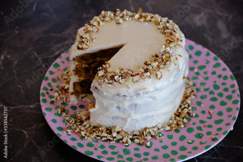 Homemade healthy carrot cake, white frosting, delicious cake, cake slice