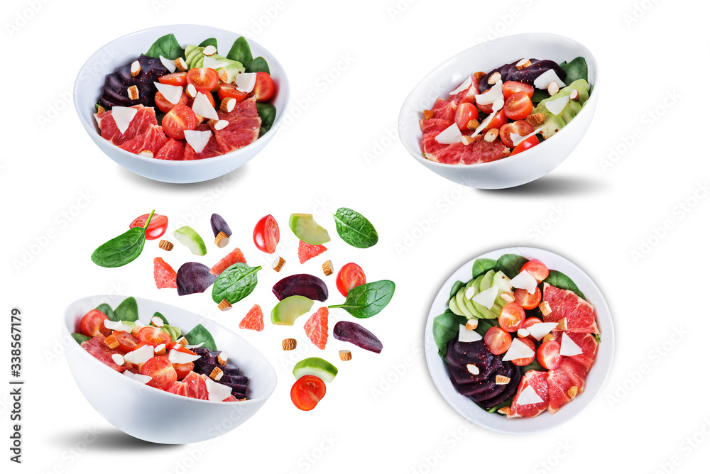 Red grapefruit beet spinach tomato salad on a white isolated background Red grapefruit beet spinach tomato salad on a white isolated background