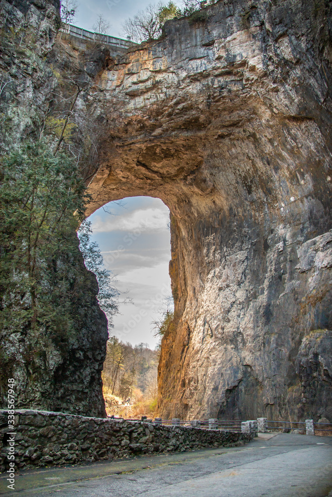 Opening in the middle of a natural bridge rock formation