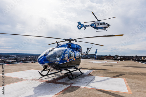 Fotografie 2 Medical Helicopters, One Flying Above