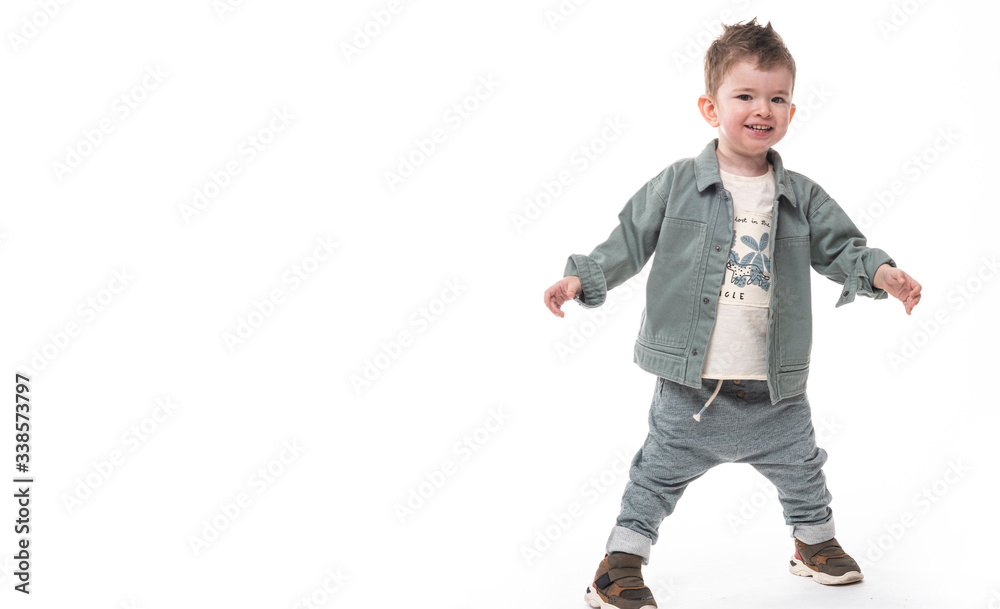 Cheerful and charming little boy posing with his bunny on white background. Cheerful and charming little boy posing with his bunny on white background.