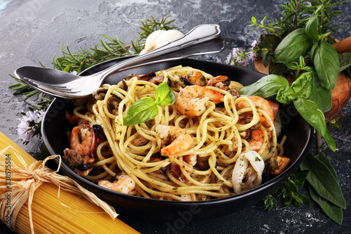Bild auf Leinwand Seafood pasta. Dish with mediterranean frutti di mare on table