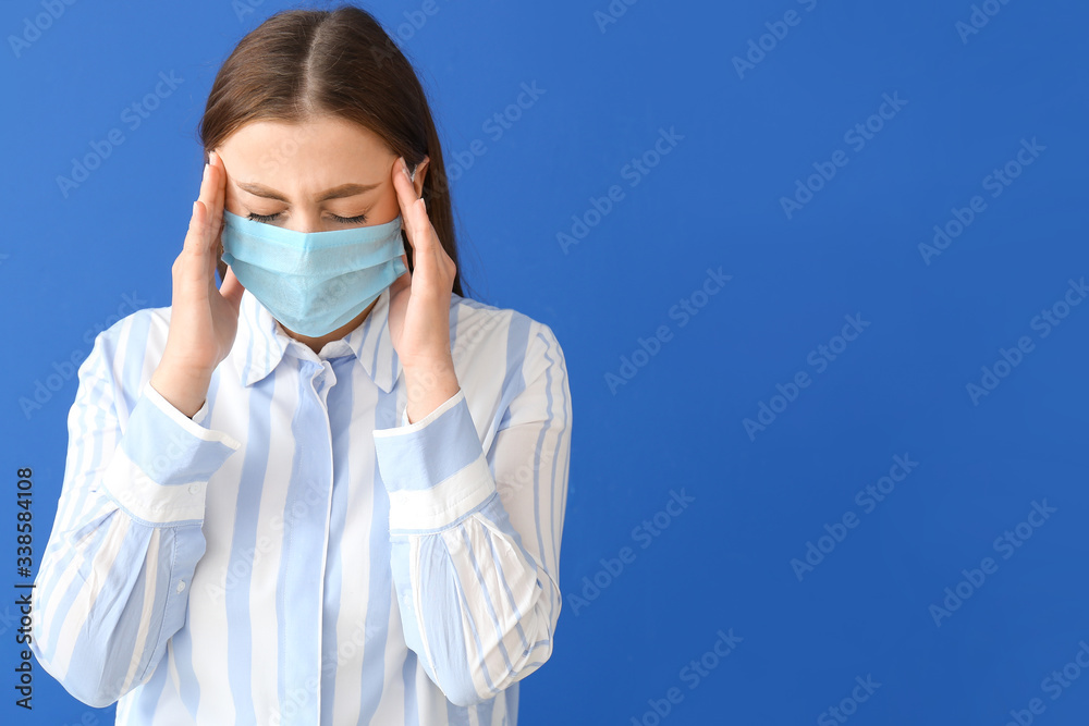 Sick woman in protective mask on color background. Concept of epidemic Sick woman in protective mask on color background. Concept of epidemic