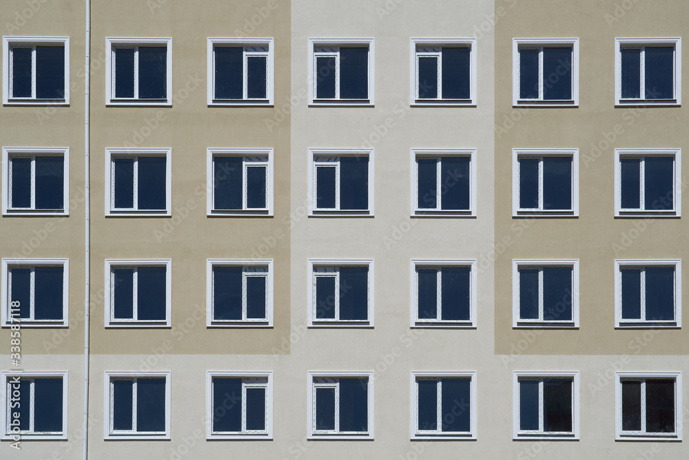 facade of a new multi-storey building with many windows
