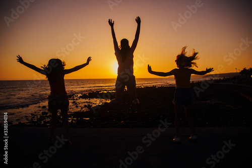 woman backlight sunset beach.