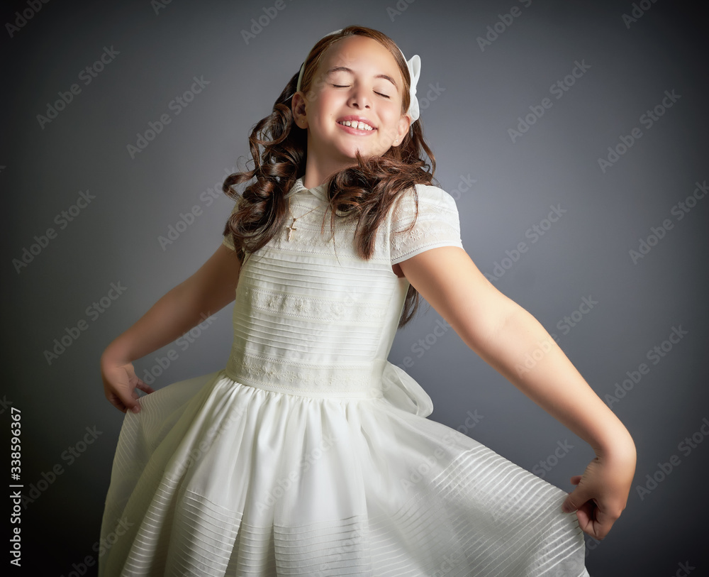 Gorgeous young girl dressed in white