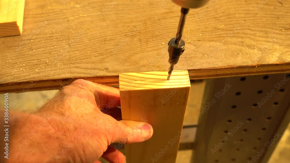 Drilling a hole along the grain in a section of dimensional pine wood