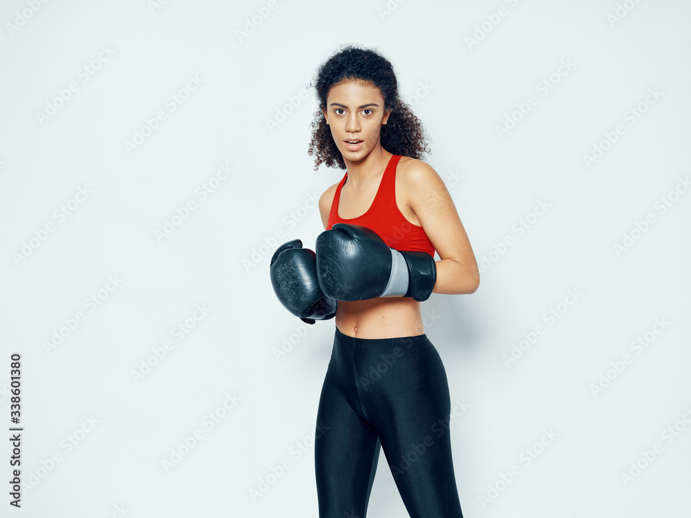 young woman with boxing gloves young woman with boxing gloves