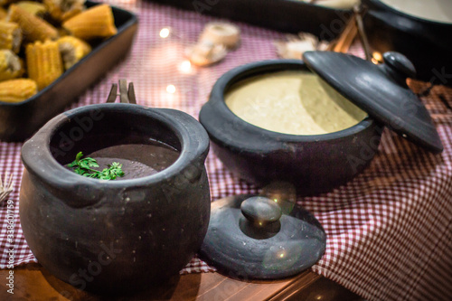 Country food in clay pot