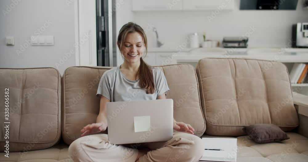 Happy brunette woman working at home, studying at home. Happy to have finished work. Emotional woman. Quarantine isolation. Close-up woman portrait Happy brunette woman working at home, studying at home. Happy to have finished work. Emotional woman. Quarantine isolation. Close-up woman portrait