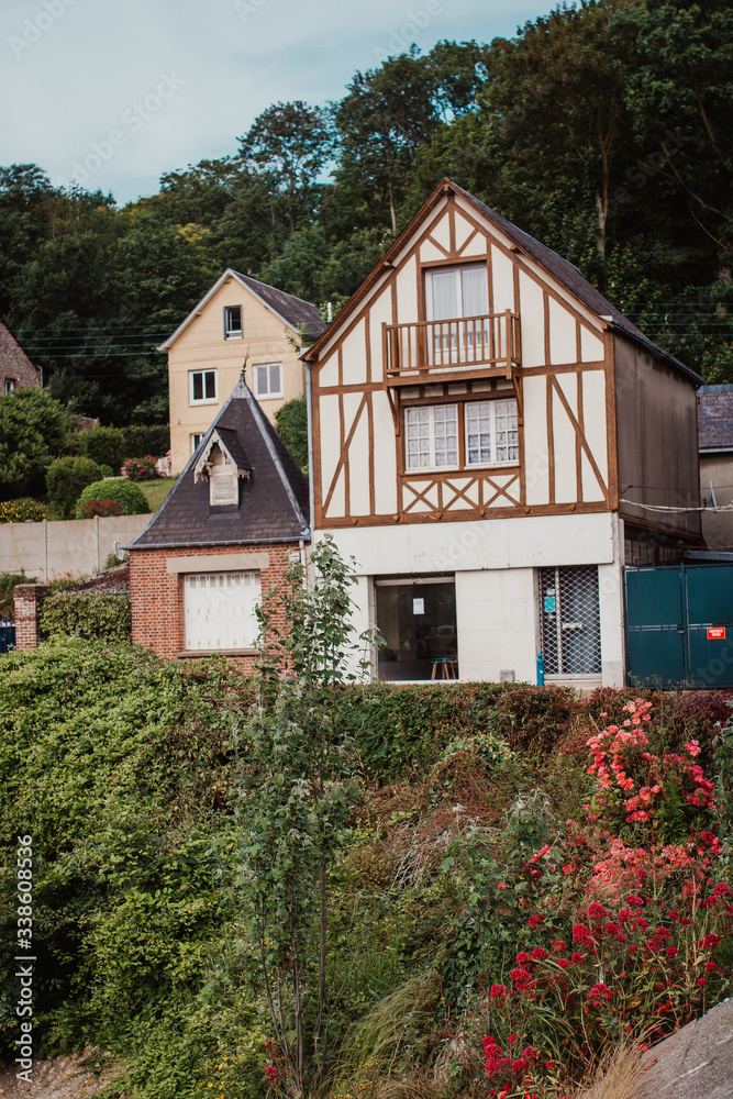 old historical houses at the entrance to the bay, France. Summer landscape