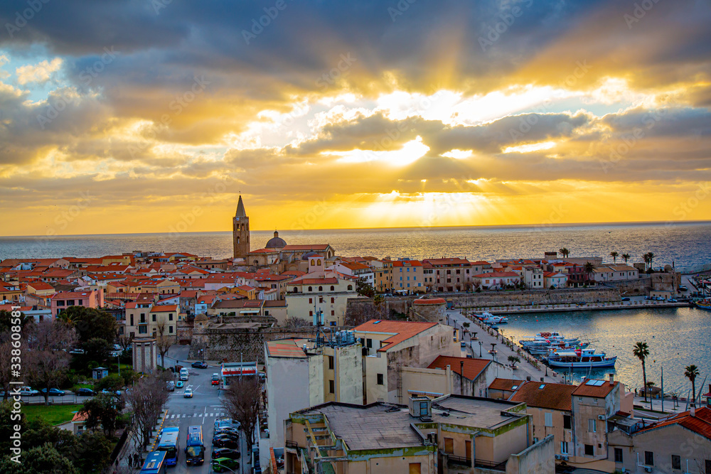 Naklejka premium Sunset in Alghero city, Sardinia
