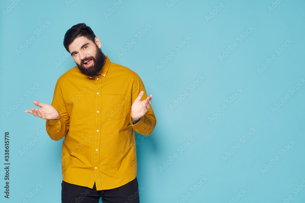 young man in yellow shirt