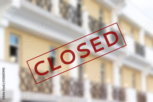 Blurred hotel background with stamp sign closed, hotel bankruptcy due quarantine, cancelled vacation