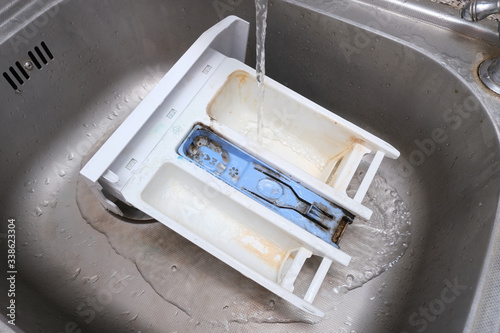 Quadro su tela Cleaning dirty moldy washing machine detergent and fabric conditioner dispenser drawer compartment