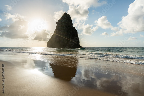 Beautiful Sunset at Cacimba do Padre beach with the view of Dois Irmaos Hill and turquoise clear water, at Fernando de Noronha, Unesco World Heritage site, Pernambuco, Brazil