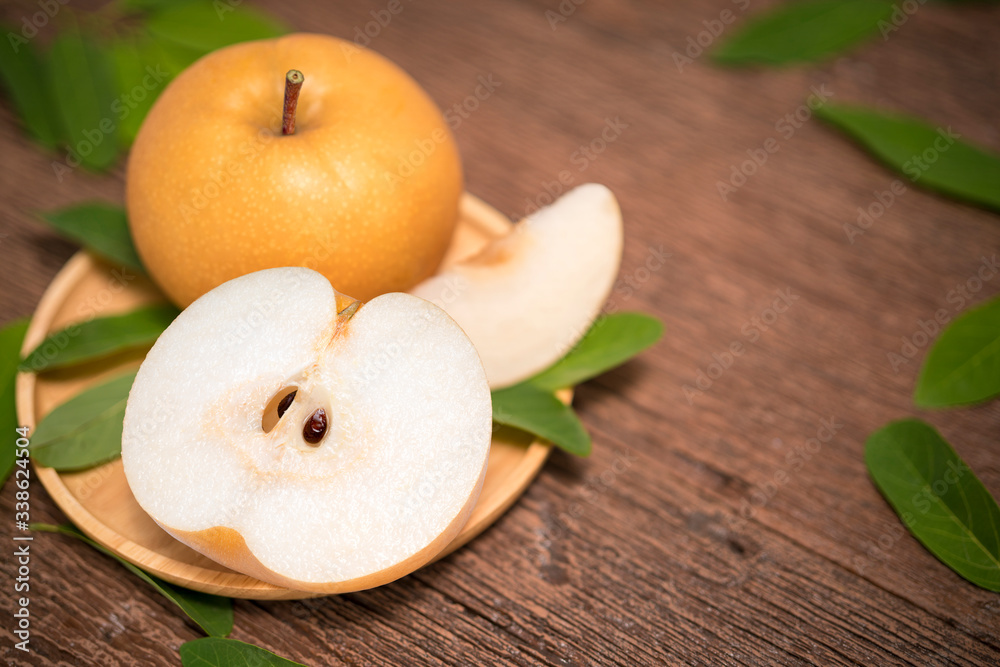 Snow pear or Korean pear on a wooden background, Nashi pear fruits delicious and sweet on wooden background