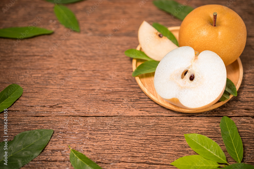 Snow pear or Korean pear on a wooden background, Nashi pear fruits delicious and sweet on wooden background