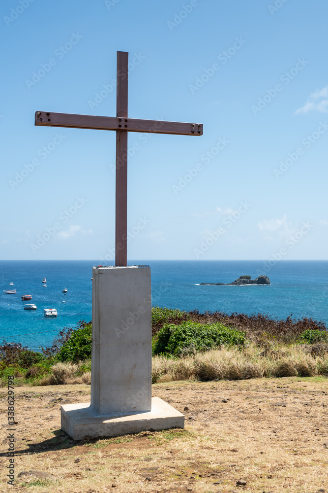 The beautiful view of the Cross near Capela de Sao Pedro dos Pescadores at Fernando de Noronha, a Unesco World Heritage site, Pernambuco, Brazil