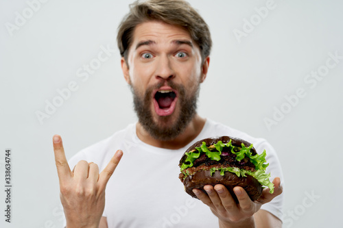 young man eating a sandwich