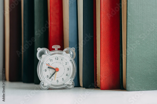 clocks and books on the windowsill