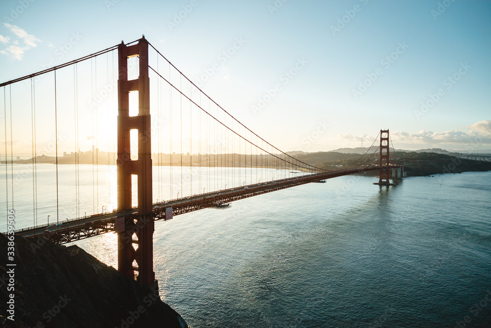 Fototapeta premium Drone image of the sunrise light-hitting San Francisco city. 