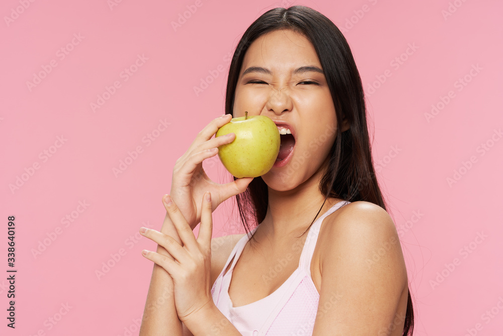 woman holding apple woman holding apple