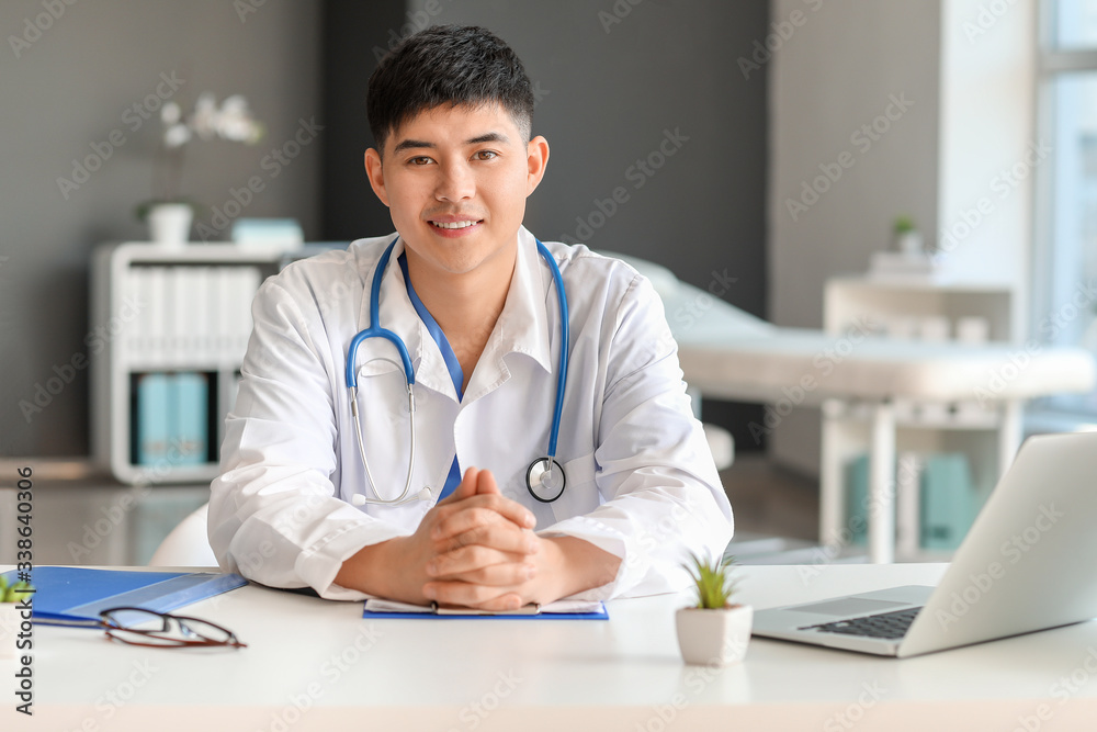 Male Asian doctor working in clinic Male Asian doctor working in clinic