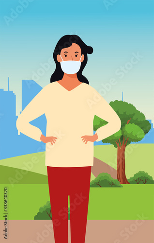 woman using face mask for covid19 in the field