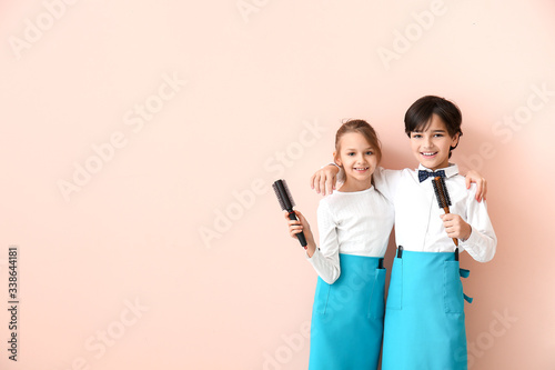 Cute little hairdressers on...