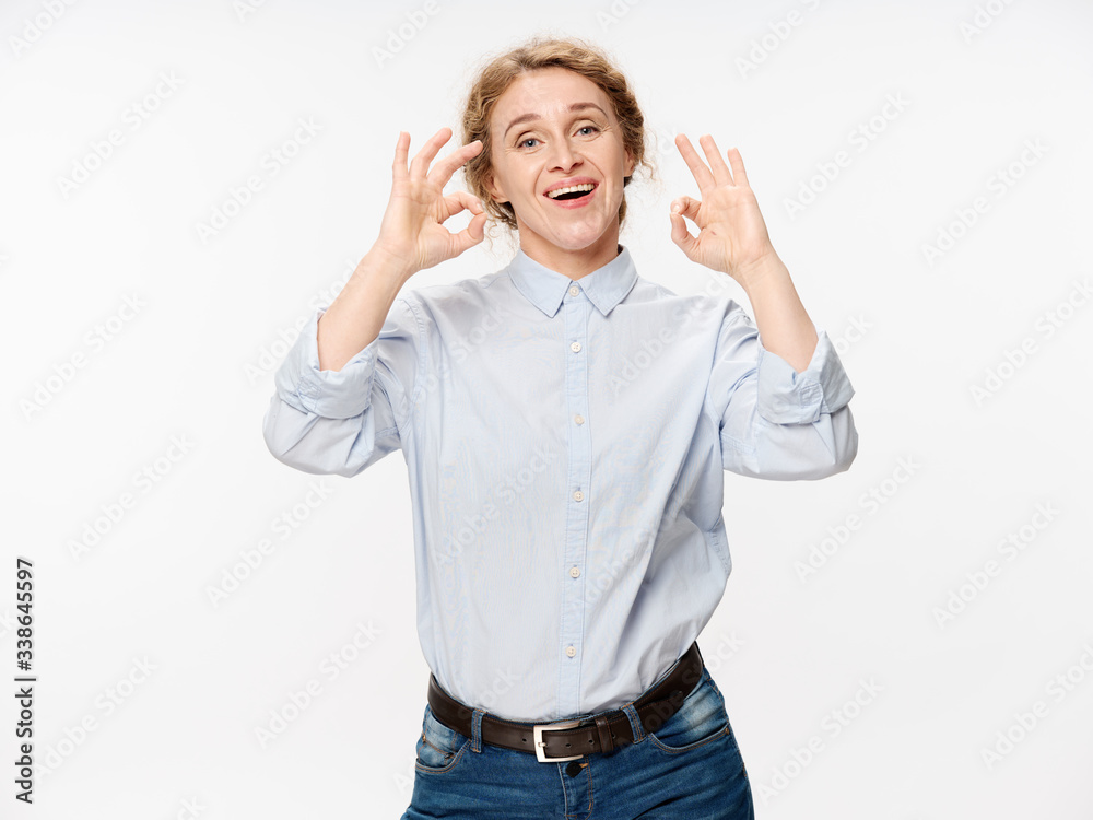 happy young man with arms raised