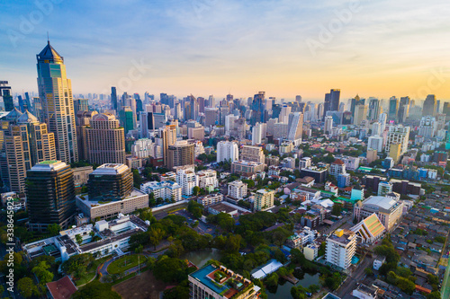 Photography Bangkok downtown city office building with green park sunset aerial view