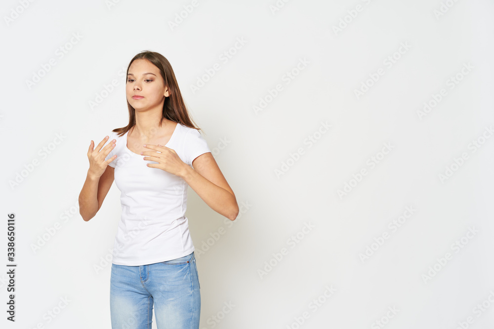 young woman pointing at something young woman pointing at something