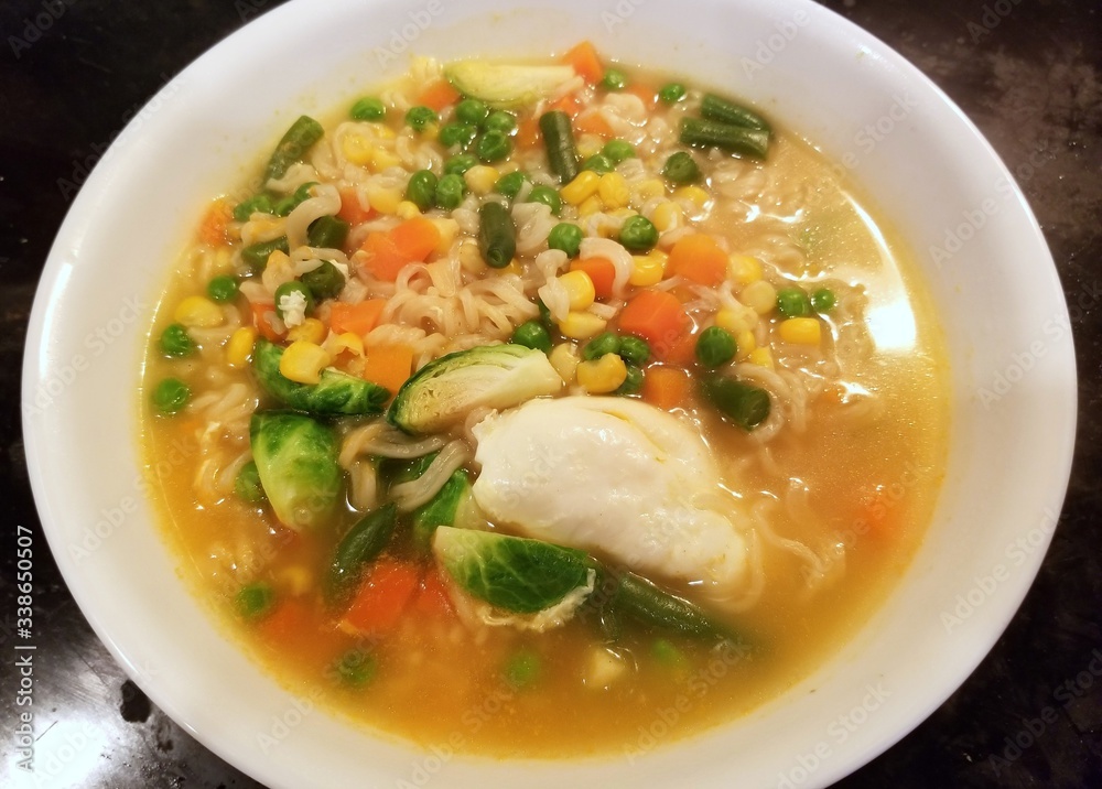 Spicy noodle with eggs, mixed vegetables and brussels sprout Spicy noodle with eggs, mixed vegetables and brussels sprout